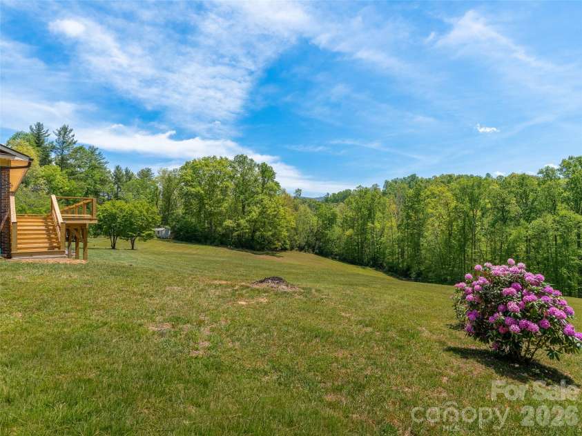 195 Red Bird Road, Spruce Pine, NC 28777.  MLS# CAR4380528, YatesRealty ID 24850. Very level usable yard!
