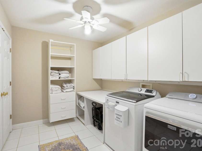 9026 Saint Pierre Lane, Charlotte, NC 28277.  MLS# CAR4381576, YatesRealty ID 24852. Oversized Laundry Room with Storage