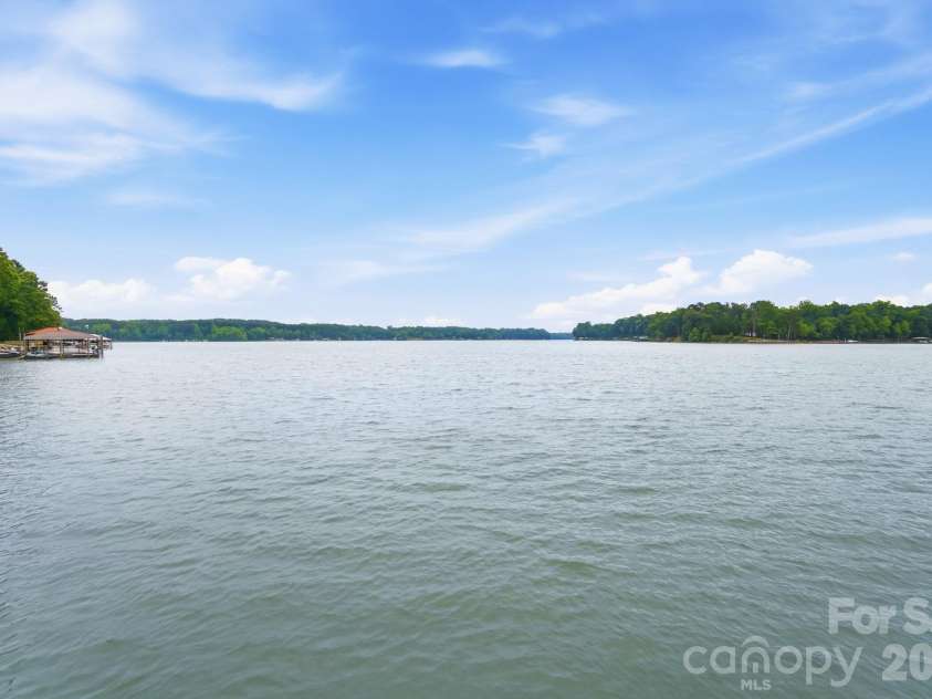221 Whiterock Drive, Mount Holly, NC 28120.  MLS# CAR4374843, YatesRealty ID 24854. Big channel views