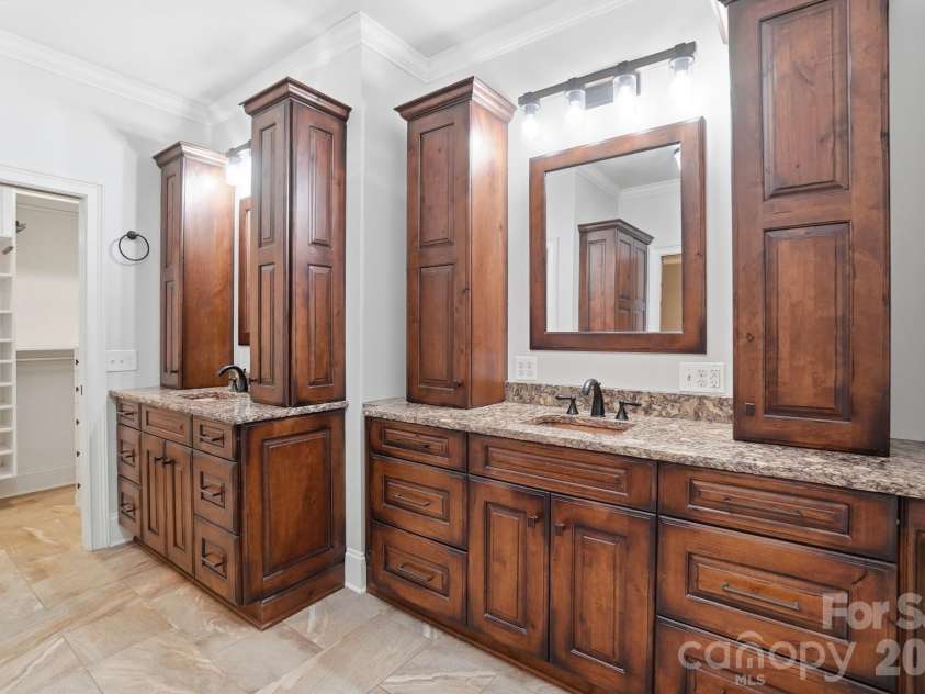 221 Whiterock Drive, Mount Holly, NC 28120.  MLS# CAR4374843, YatesRealty ID 24854. Dual vanities in primary bathroom