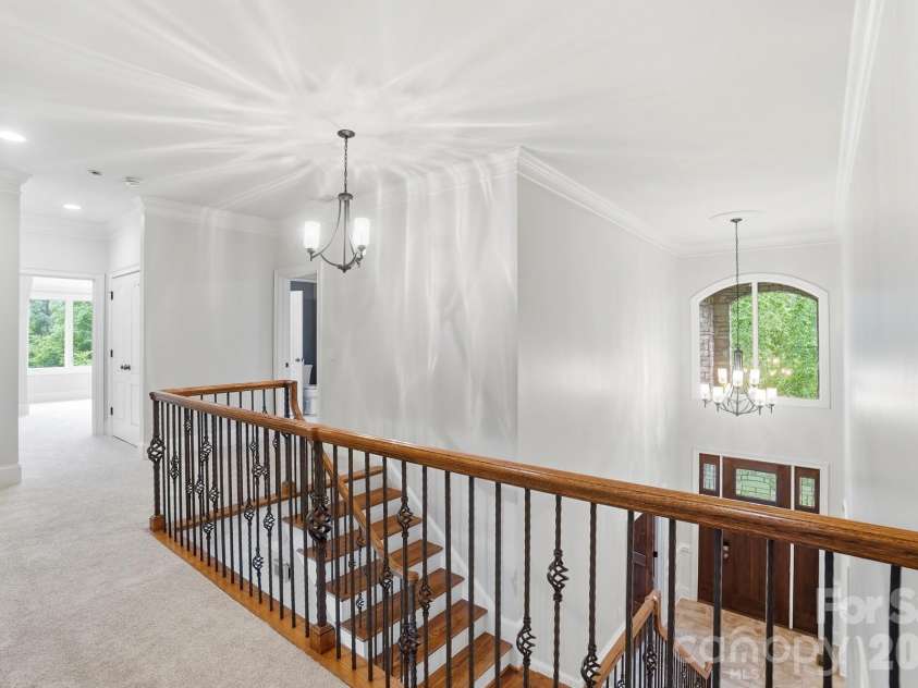 221 Whiterock Drive, Mount Holly, NC 28120.  MLS# CAR4374843, YatesRealty ID 24854. Iron balusters