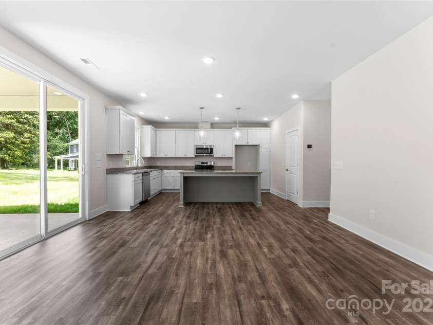 1651 Carolina Circle, Gastonia, NC 28054.  MLS# CAR4288979, YatesRealty ID 24855. Living/Dining/Kitchen