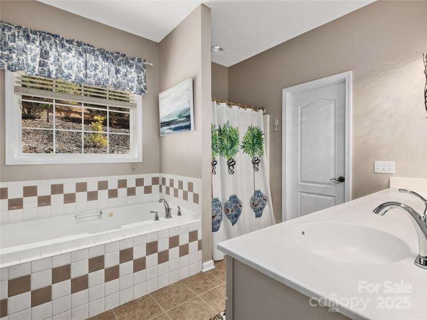 155 Jonathan Creek Drive, Etowah, NC 28729.  MLS# CAR4237572, YatesRealty ID 2486. 