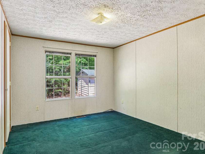 125 Cove Creek Drive, Rutherfordton, NC 28139.  MLS# CAR4384010, YatesRealty ID 24863. 