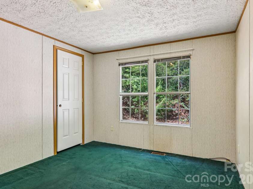 125 Cove Creek Drive, Rutherfordton, NC 28139.  MLS# CAR4384010, YatesRealty ID 24863. 
