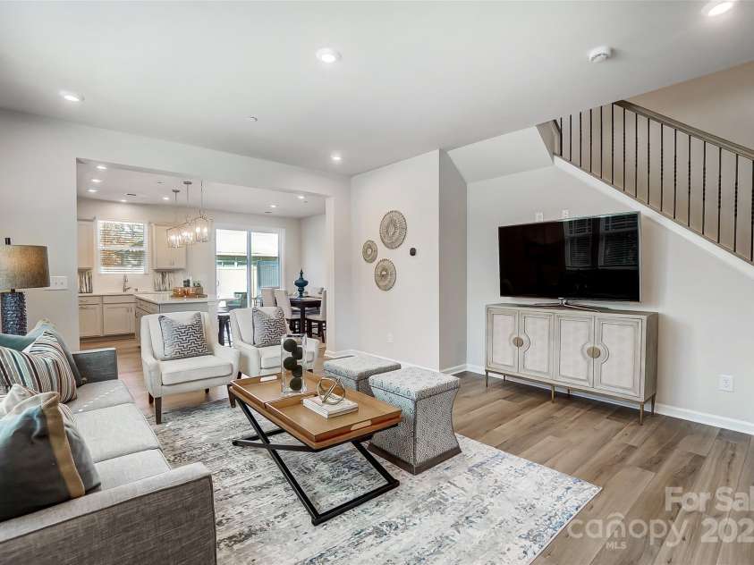 2465 Hedgecliff Road, Kannapolis, NC 28025.  MLS# CAR4270014, YatesRealty ID 24864. Living Room with View of Stairs-Photo Similar to Subject Property
