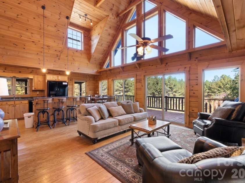105 Palisade Drive, Mill Spring, NC 28756.  MLS# CAR4384255, YatesRealty ID 24866. Beautiful log home!