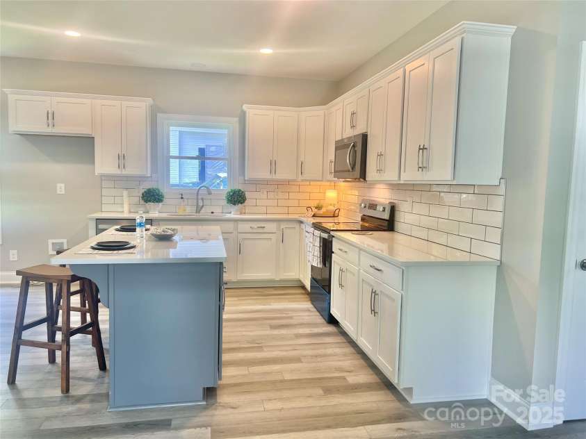 325 Jordan Avenue, Spencer, NC 28159.  MLS# CAR4269843, YatesRealty ID 24867. Island -