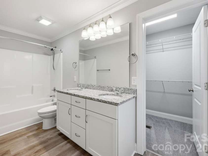 2601 Penninger Road, Concord, NC 28025.  MLS# CAR4381603, YatesRealty ID 24870. Ensuite bathroom with double sinks 