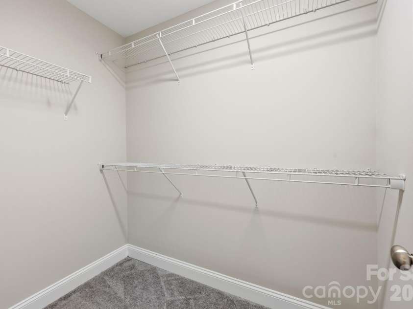 2601 Penninger Road, Concord, NC 28025.  MLS# CAR4381603, YatesRealty ID 24870. Walk in closet in Primary
