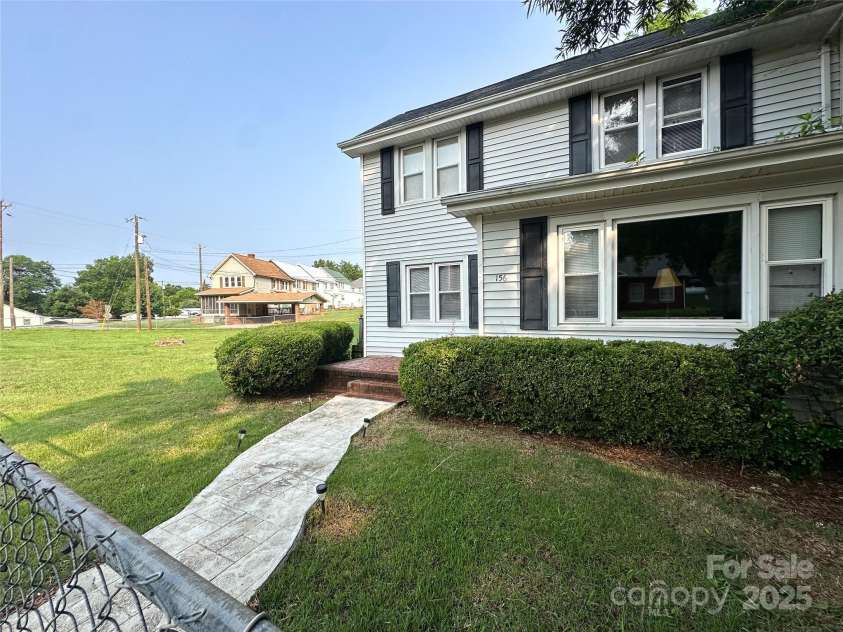 156 Spruce Street, Badin, NC 28009.  MLS# CAR4267192, YatesRealty ID 24872. 
