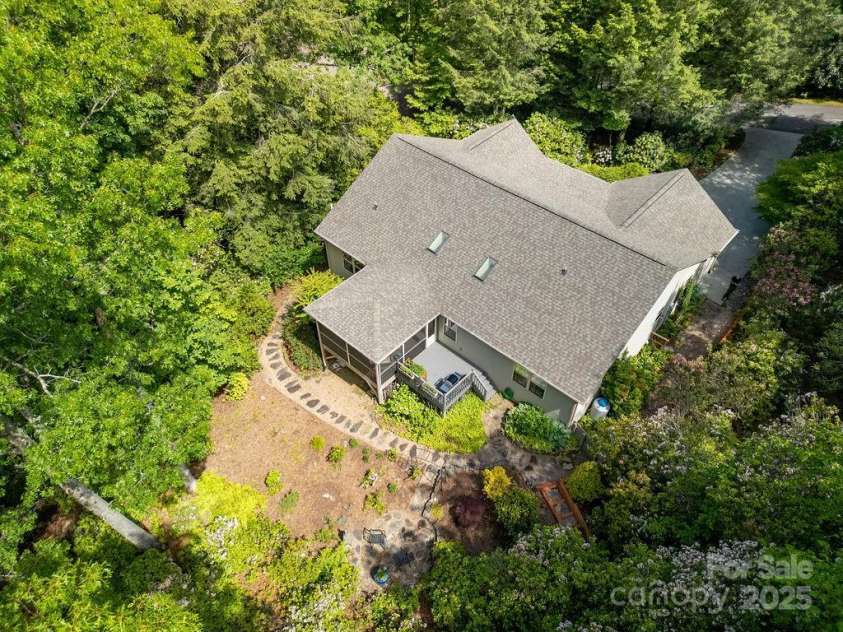 92 Nodatsi Court, Brevard, NC 28712.  MLS# CAR4268723, YatesRealty ID 24873. .85 acres of privacy