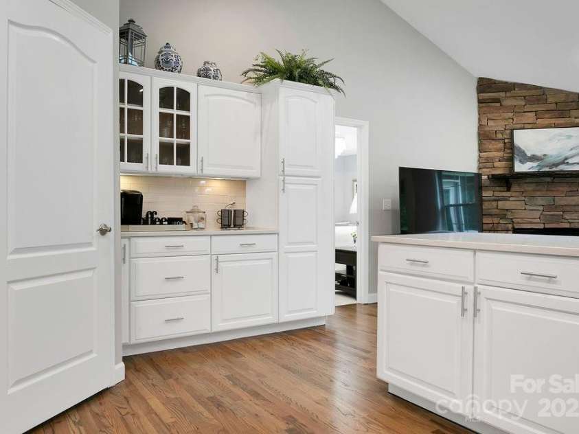 92 Nodatsi Court, Brevard, NC 28712.  MLS# CAR4268723, YatesRealty ID 24873. Coffee bar & under cabinet lighting
