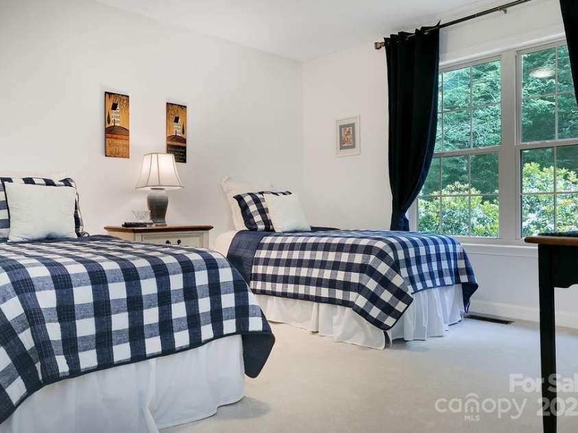 92 Nodatsi Court, Brevard, NC 28712.  MLS# CAR4268723, YatesRealty ID 24873. Guest room #1 on the main for convenience