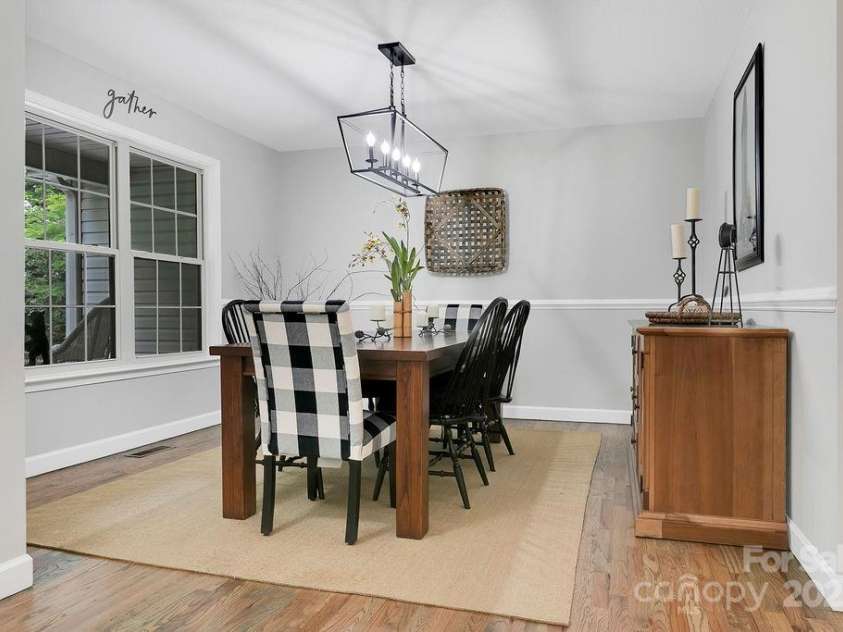 92 Nodatsi Court, Brevard, NC 28712.  MLS# CAR4268723, YatesRealty ID 24873. Large windows for natural light