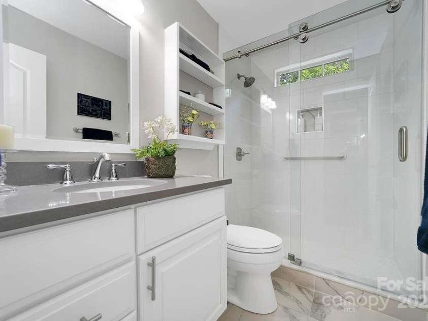 92 Nodatsi Court, Brevard, NC 28712.  MLS# CAR4268723, YatesRealty ID 24873. Second main floor bath is updated & spotless