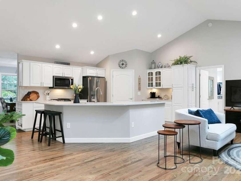 92 Nodatsi Court, Brevard, NC 28712.  MLS# CAR4268723, YatesRealty ID 24873. The huge quartz island offers seating