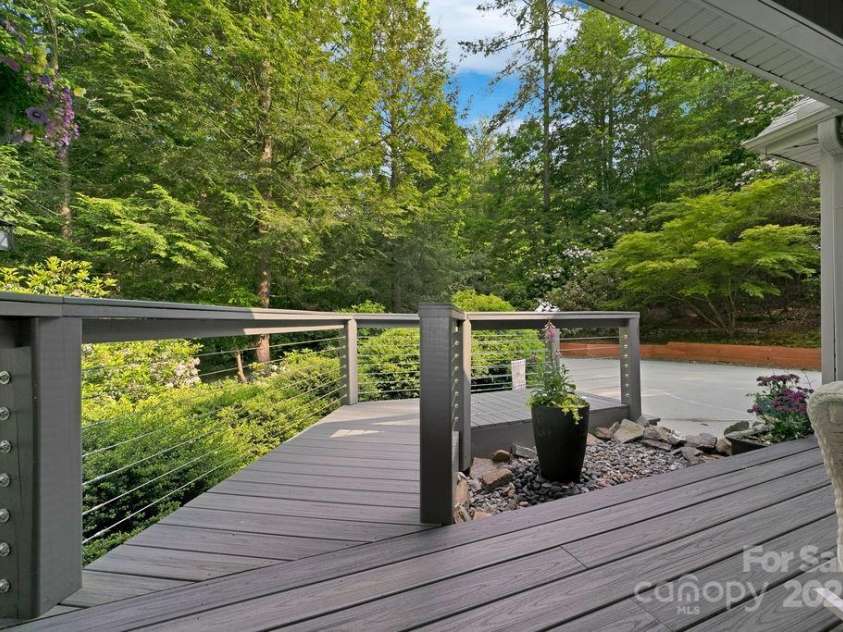 92 Nodatsi Court, Brevard, NC 28712.  MLS# CAR4268723, YatesRealty ID 24873. Trex decking for easy maintenance...