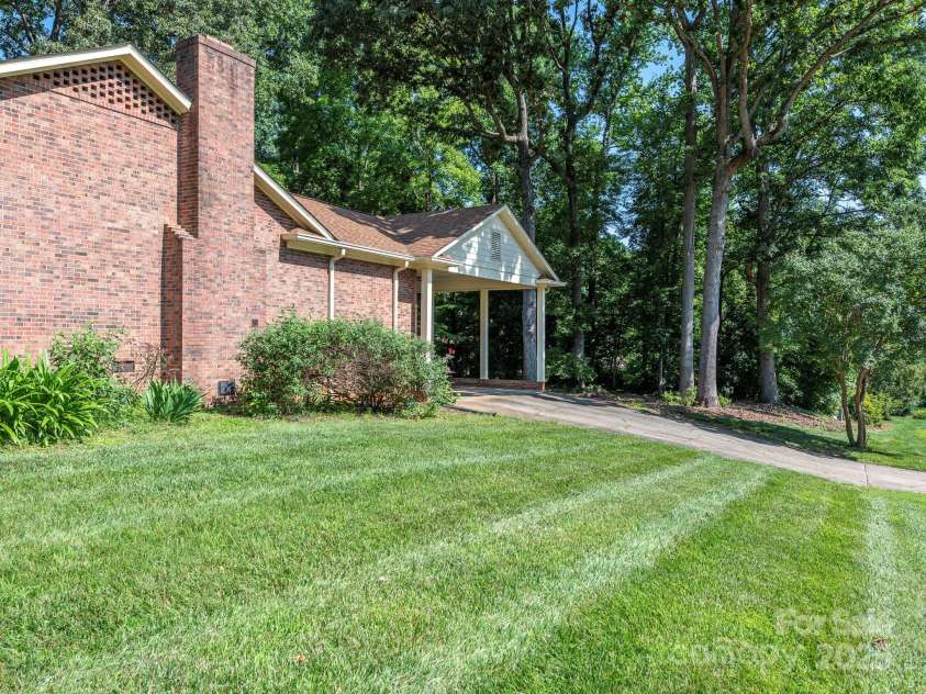 2222 Hearthstone Drive, Gastonia, NC 28056.  MLS# CAR4256250, YatesRealty ID 24878. Side yard