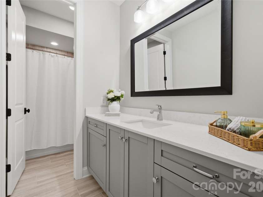 1016 Thatcher Way, Fort Mill, SC 29715.  MLS# CAR4337536, YatesRealty ID 24880. Sleek Vanity and Full Bath Ensuite