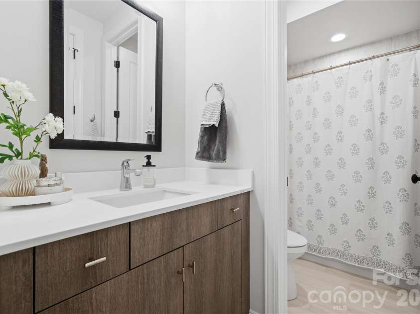 1016 Thatcher Way, Fort Mill, SC 29715.  MLS# CAR4337536, YatesRealty ID 24880. Upgraded Vanity in Secondary Suite