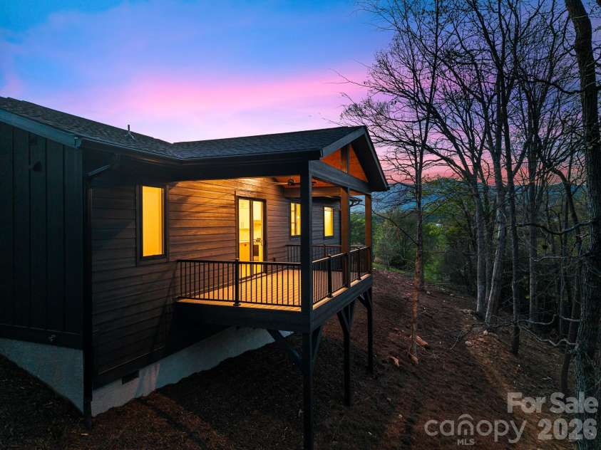 28 Lauren Lane, Candler, NC 28715.  MLS# CAR4365206, YatesRealty ID 24882. Virtually staged sunset
