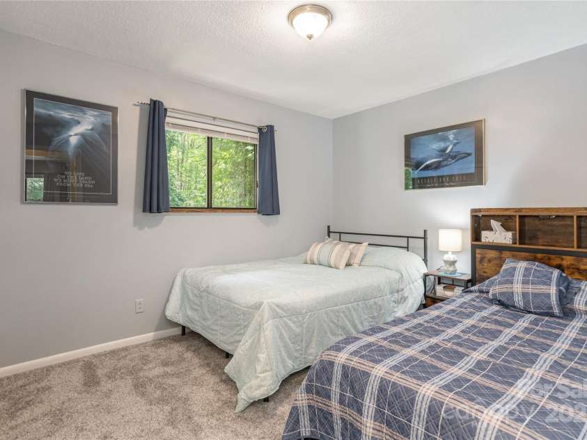 64 Mine Mountain Drive, Pisgah Forest, NC 28768.  MLS# CAR4277218, YatesRealty ID 24886. 