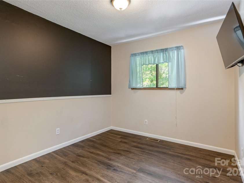 64 Mine Mountain Drive, Pisgah Forest, NC 28768.  MLS# CAR4277218, YatesRealty ID 24886. 