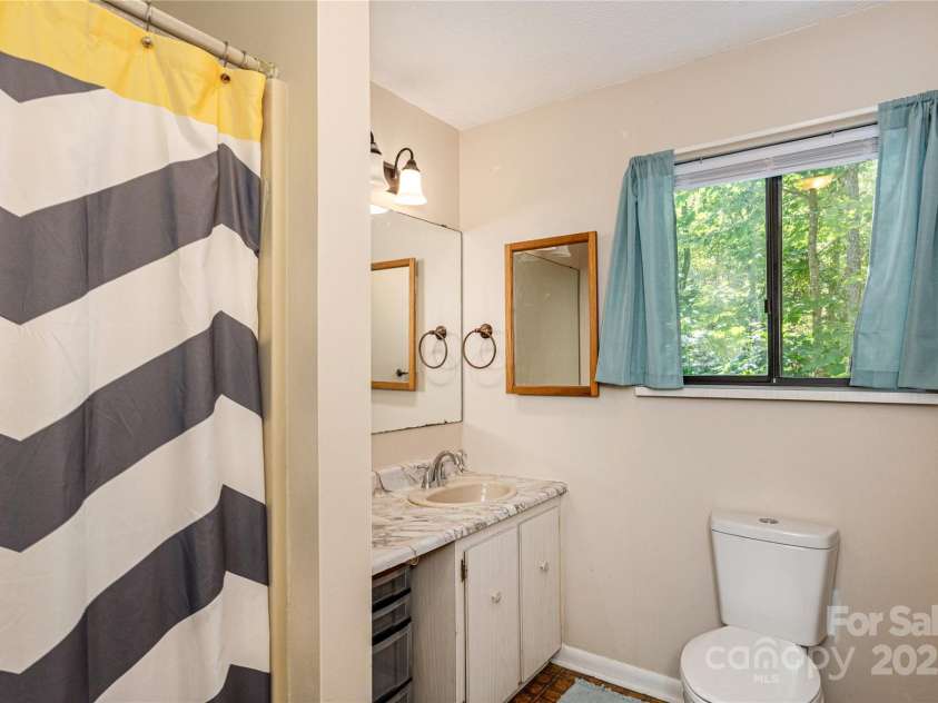 64 Mine Mountain Drive, Pisgah Forest, NC 28768.  MLS# CAR4277218, YatesRealty ID 24886. 