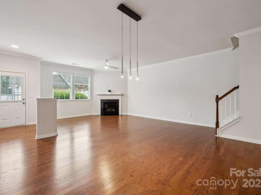 17916 Ragtop Day Lane, Cornelius, NC 28031.  MLS# CAR4256712, YatesRealty ID 24889. Hardwood flooring throughout the living room