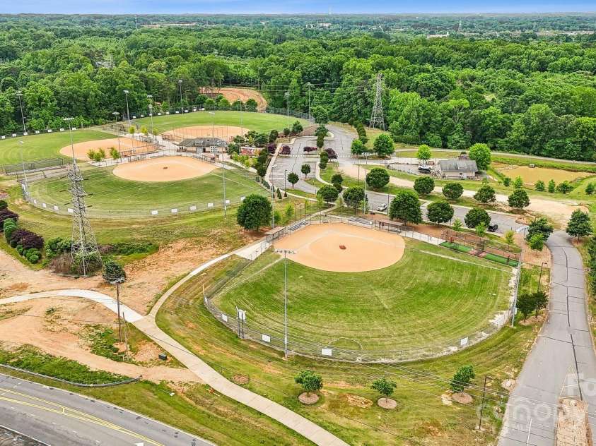 17916 Ragtop Day Lane, Cornelius, NC 28031.  MLS# CAR4256712, YatesRealty ID 24889. The view of Westmoreland Park w/ baseball fields and playgrounds
