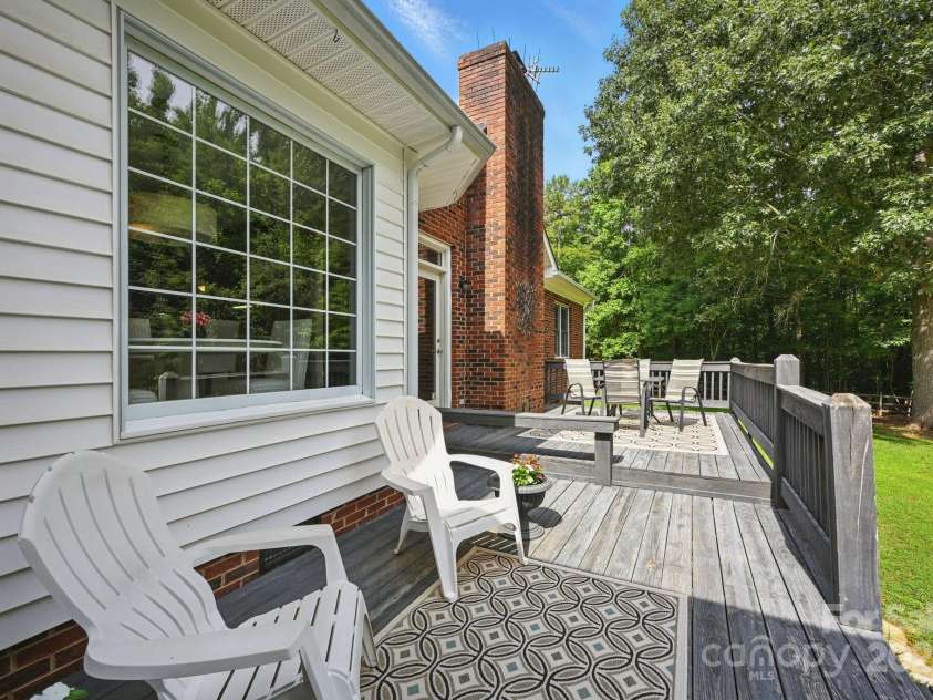 4824 Waxhaw Farms Road, Waxhaw, NC 28173.  MLS# CAR4270234, YatesRealty ID 24893. Let's take a look at the expansive 354 sq. ft. Deck! Yes, you go ahead and have those Summer cookouts there's plenty of room for everyone! Plus, the privacy and view are amazing!