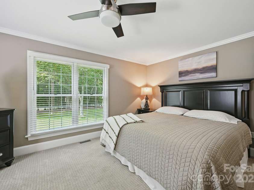 4824 Waxhaw Farms Road, Waxhaw, NC 28173.  MLS# CAR4270234, YatesRealty ID 24893. The split floor plan has your spacious Primary suite positioned beautifully to take in the outdoor scenery!