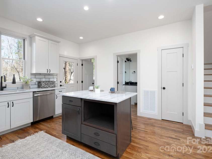 88 Pershing Road, Asheville, NC 28805.  MLS# CAR4204009, YatesRealty ID 24896. Powder Room and Laundry off Kitchen