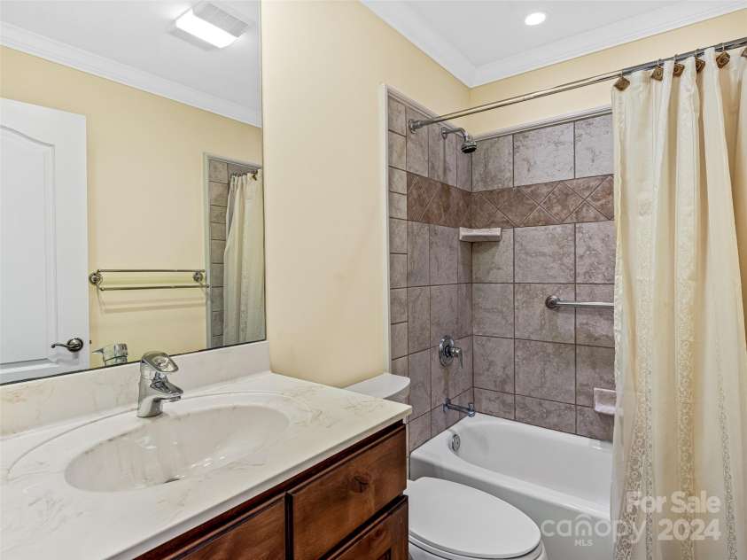 409 Elk Mountain Trail, Brevard, NC 28712.  MLS# CAR4196213, YatesRealty ID 249. En suite bath.