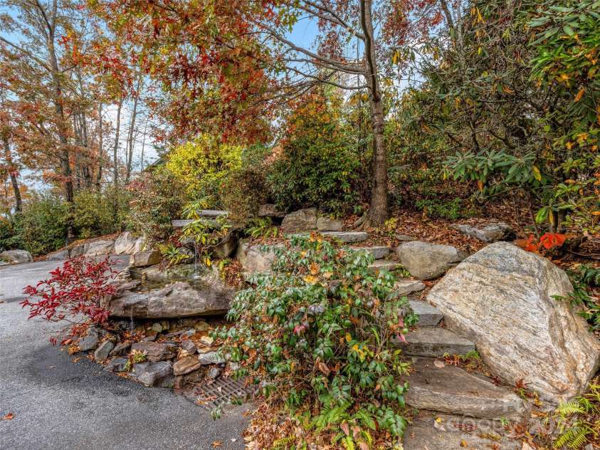 409 Elk Mountain Trail, Brevard, NC 28712.  MLS# CAR4196213, YatesRealty ID 249. Extensive hardscape features.
