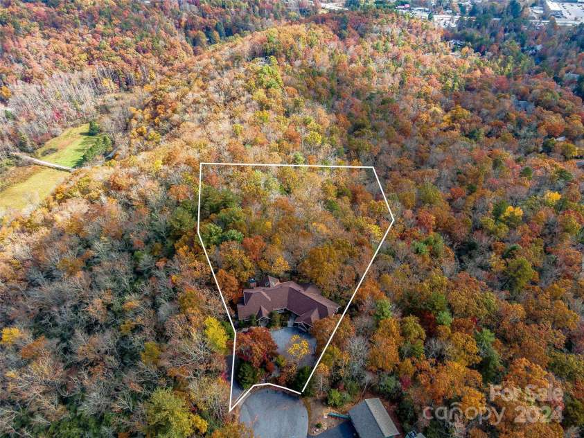 409 Elk Mountain Trail, Brevard, NC 28712.  MLS# CAR4196213, YatesRealty ID 249. Private high point in Straus Park