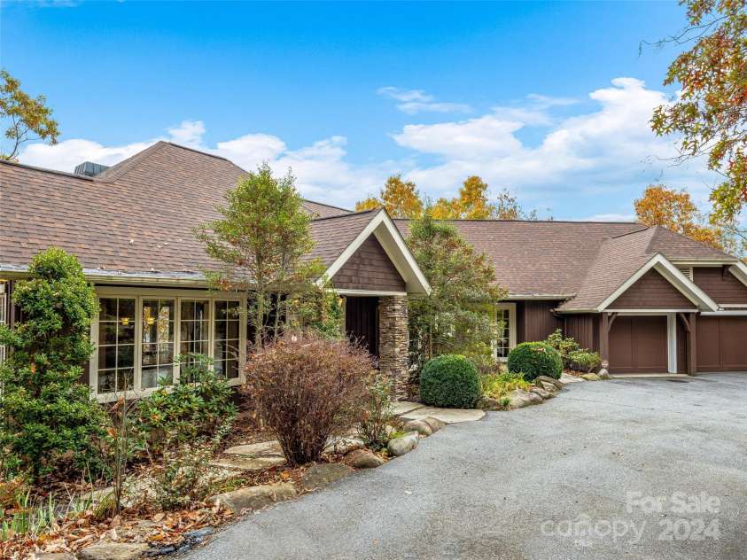 409 Elk Mountain Trail, Brevard, NC 28712.  MLS# CAR4196213, YatesRealty ID 249. Welcome. Courtyard