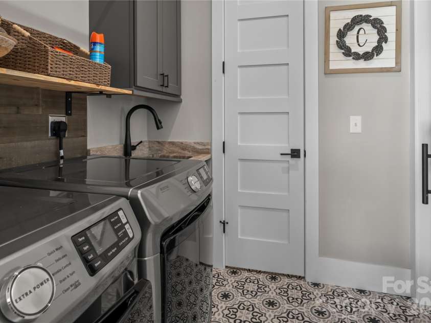 122 Wintercress Drive, Mills River, NC 28759.  MLS# CAR4361949, YatesRealty ID 24904. Laundry