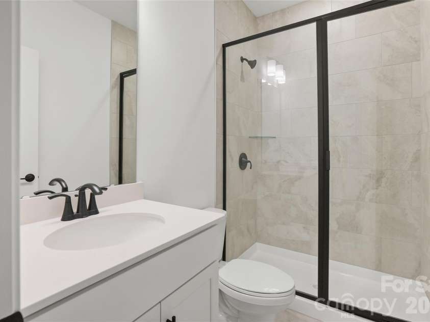2024 Waxhaw Crossing Drive, Waxhaw, NC 28173.  MLS# CAR4325572, YatesRealty ID 24905. Guest Bath