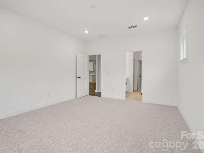 2024 Waxhaw Crossing Drive, Waxhaw, NC 28173.  MLS# CAR4325572, YatesRealty ID 24905. Owner's Suite