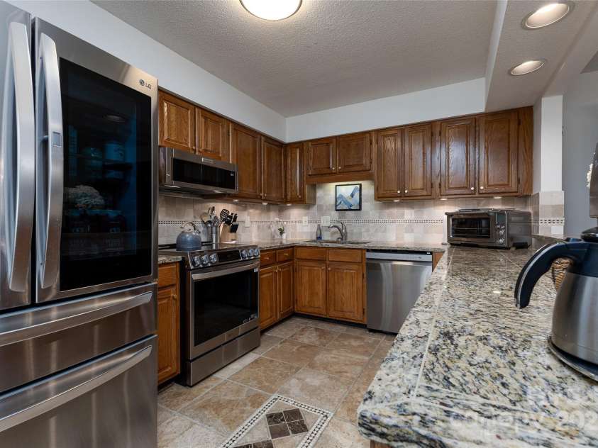 116 Fairway Villas Drive, Sapphire, NC 28774.  MLS# CAR4274968, YatesRealty ID 24907. 