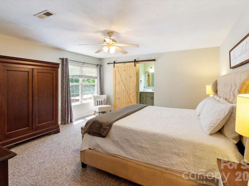 42 Bushwald Lane, Swannanoa, NC 28778.  MLS# CAR4369752, YatesRealty ID 24907. Primary Bedroom Suite