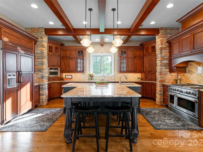 280 Walnut Hollow Road, Brevard, NC 28712.  MLS# CAR4235278, YatesRealty ID 2491. Chef's Kitchen with ample storage and an oversized island