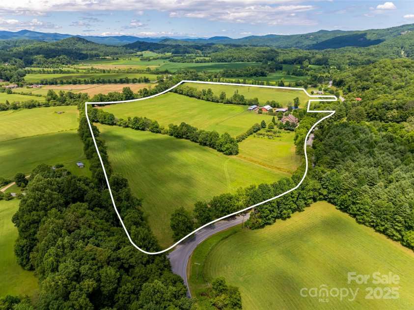 280 Walnut Hollow Road, Brevard, NC 28712.  MLS# CAR4235278, YatesRealty ID 2491. Idyllic 52 acre farm nestled alongside the French Broad River