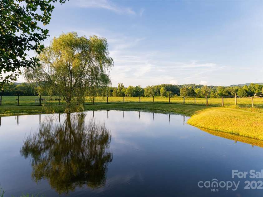 280 Walnut Hollow Road, Brevard, NC 28712.  MLS# CAR4235278, YatesRealty ID 2491. Idyllic pond on property