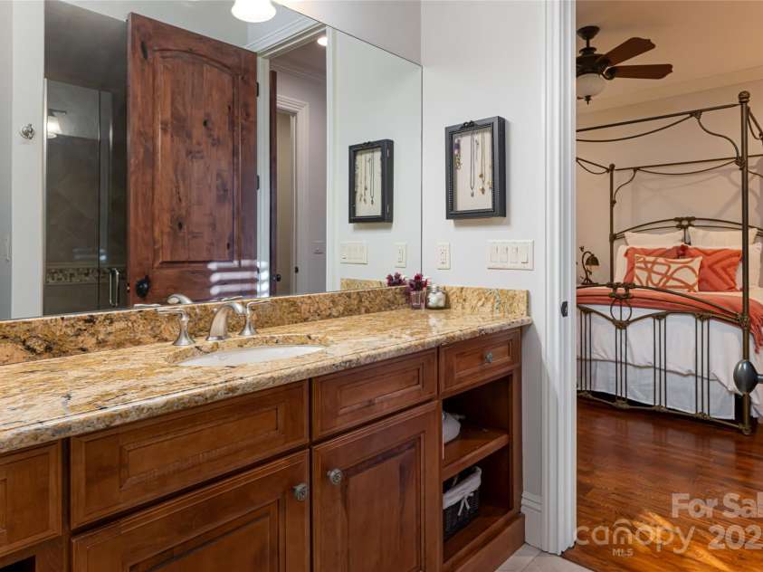 280 Walnut Hollow Road, Brevard, NC 28712.  MLS# CAR4235278, YatesRealty ID 2491. Lower Level Guest Bedroom 2 ensuite Bath