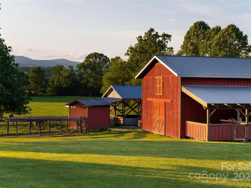 280 Walnut Hollow Road, Brevard, NC 28712.  MLS# CAR4235278, YatesRealty ID 2491. Multiple outbuildings provide ample space for agricultural pursuits