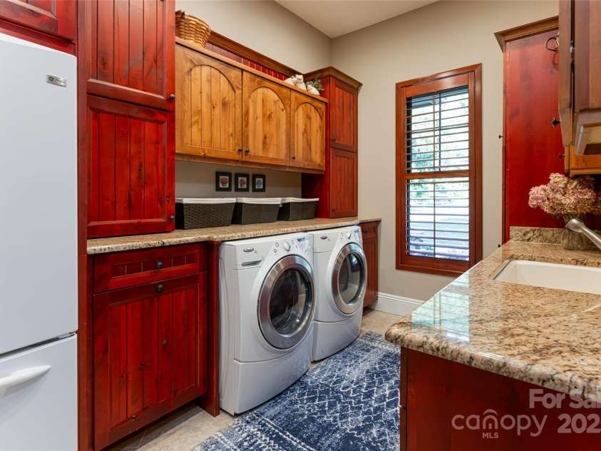 280 Walnut Hollow Road, Brevard, NC 28712.  MLS# CAR4235278, YatesRealty ID 2491. Oversized laundry provides ample storage space