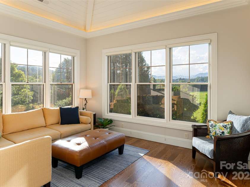 280 Walnut Hollow Road, Brevard, NC 28712.  MLS# CAR4235278, YatesRealty ID 2491. Sun room off the back of the house